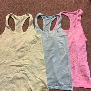 Bundle of 3 lululemon swiftly tanks! Size 8